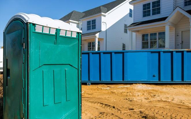 dumpster and portable toilet at a construction site project in Newark CA